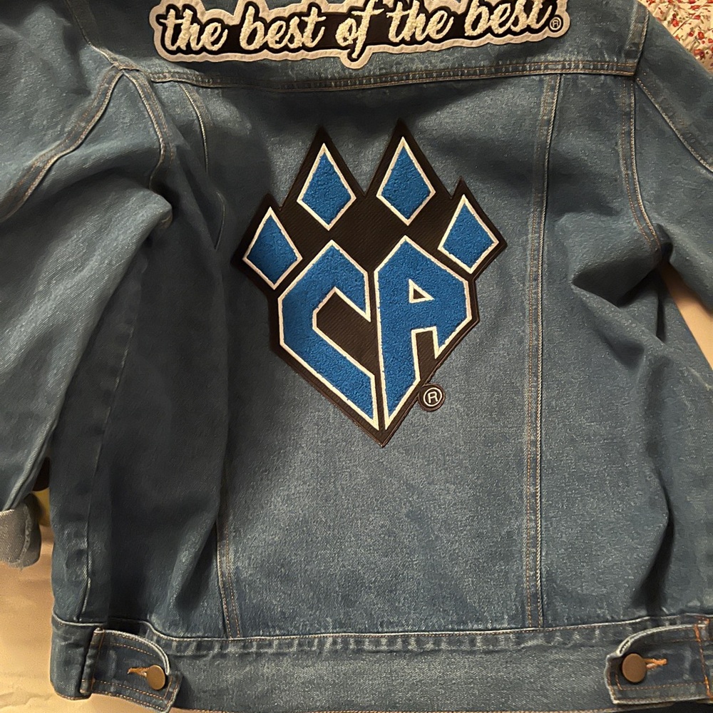 Cheer Athletics Denim Jacket with Black and Blue Patch